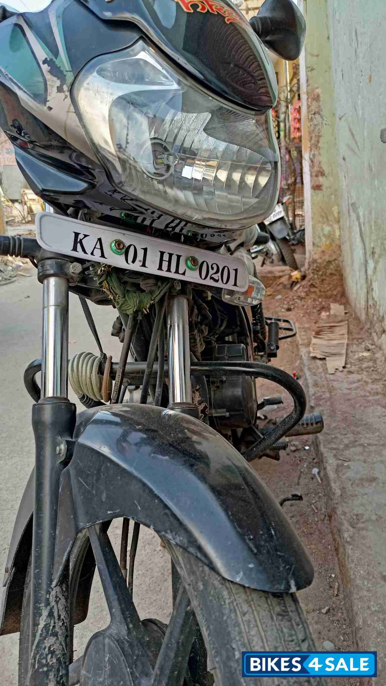 Black With Gold And Green Bajaj Discover 100