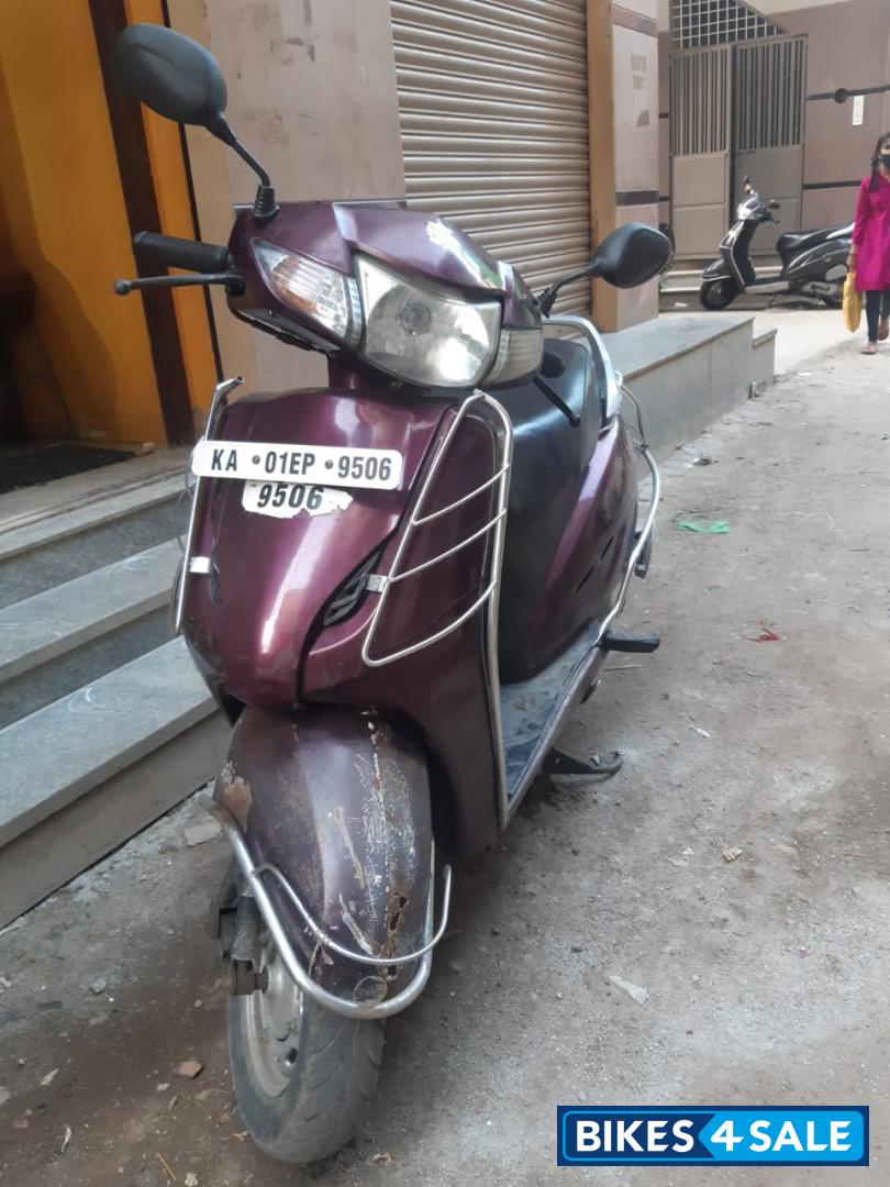 Maroon Honda Activa Maroon Honda Activa