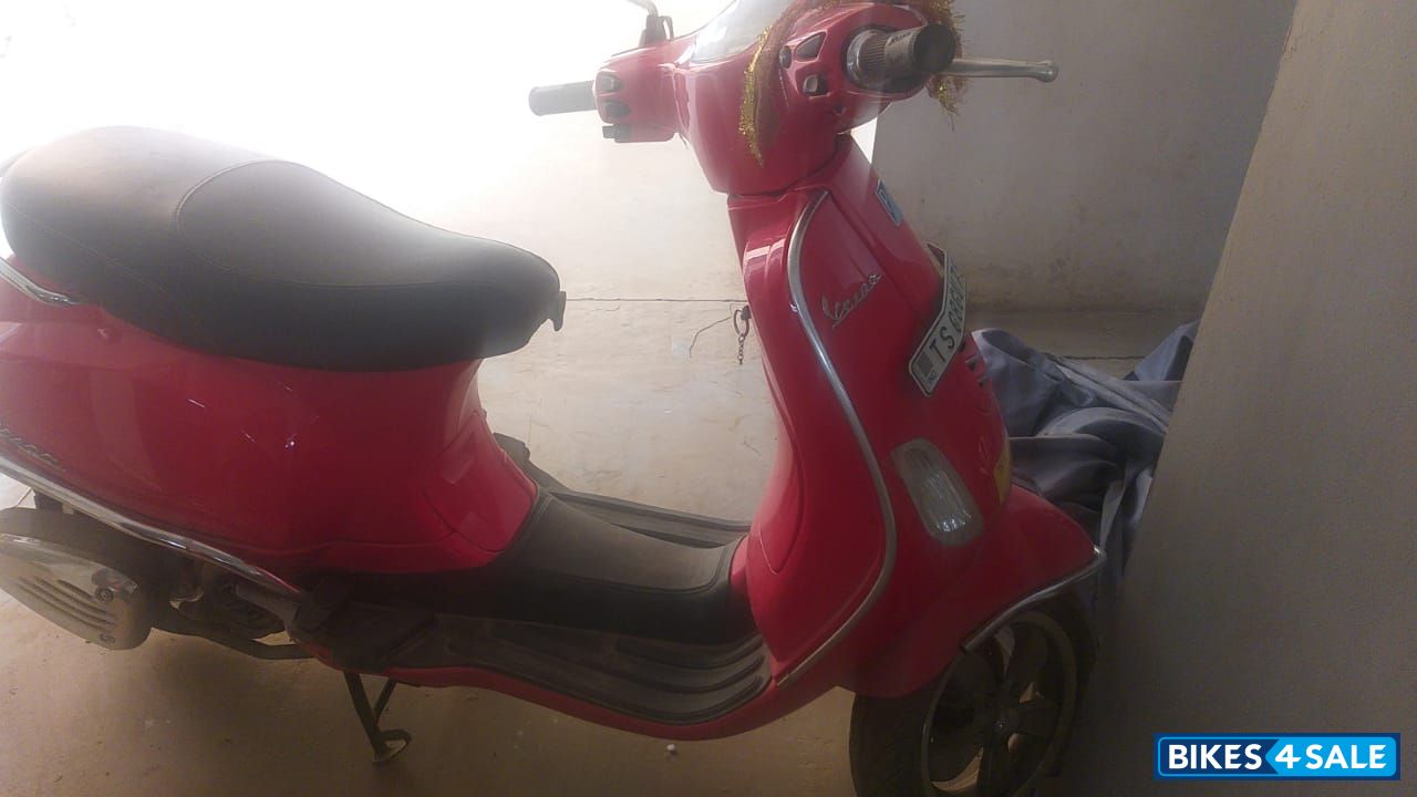 Pink Vespa VXL 149 ABS