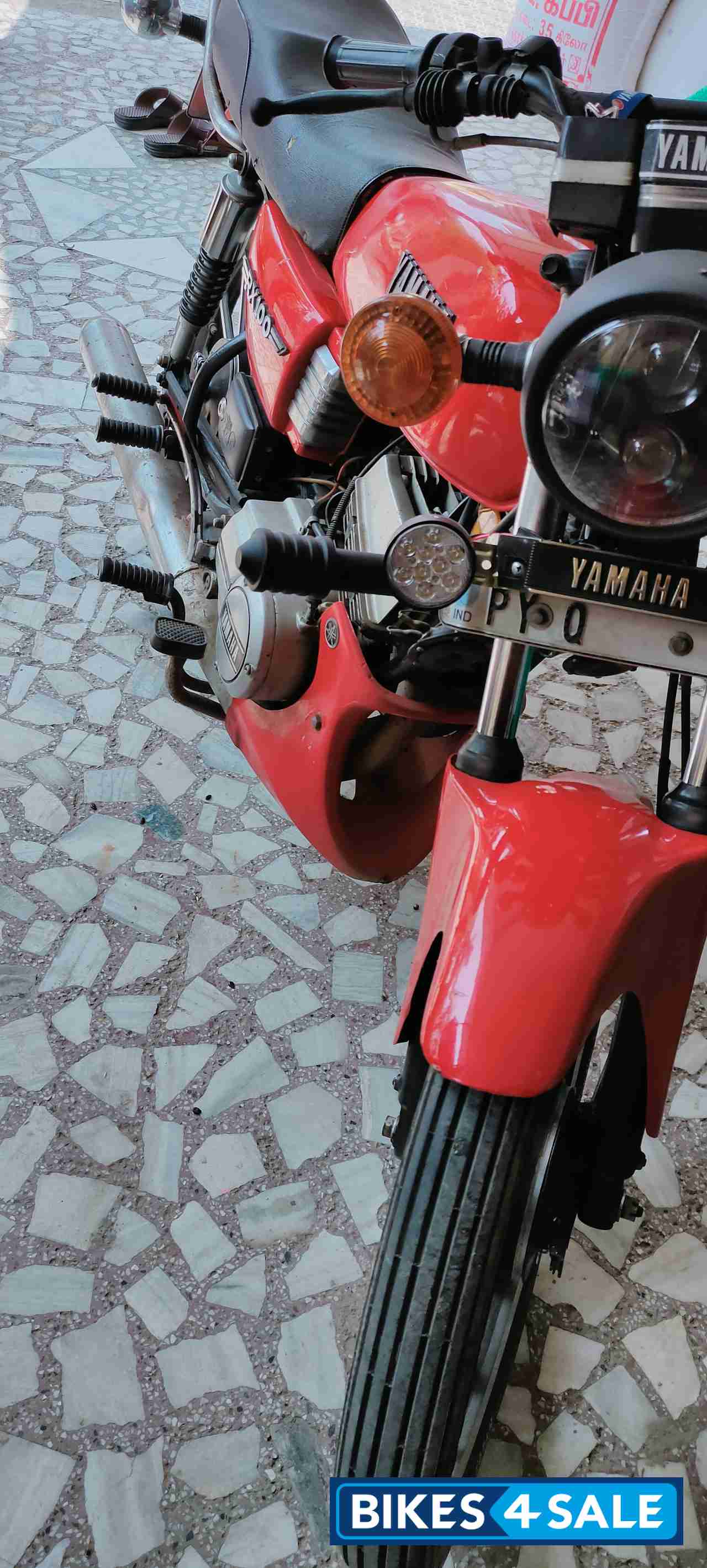 Red Yamaha RX 100