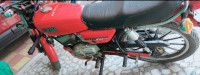 Red Yamaha RX 100