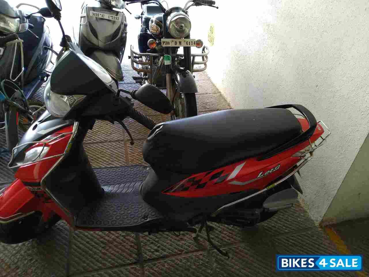 Red Suzuki Lets 110