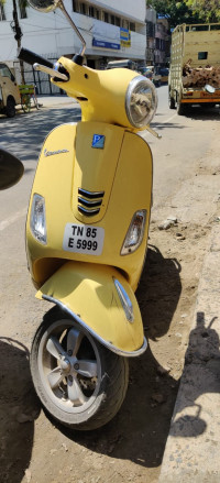 Yellow Vespa VXL 150
