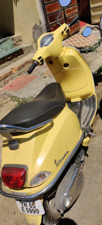 Yellow Vespa VXL 150