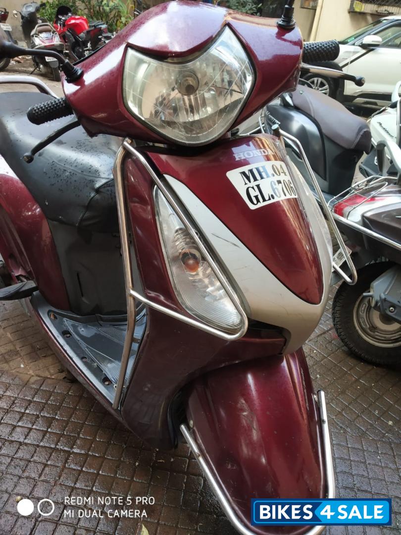Maroon Honda Aviator
