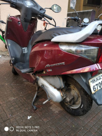 Maroon Honda Aviator