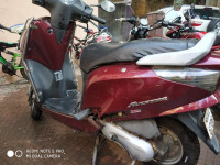 Maroon Honda Aviator