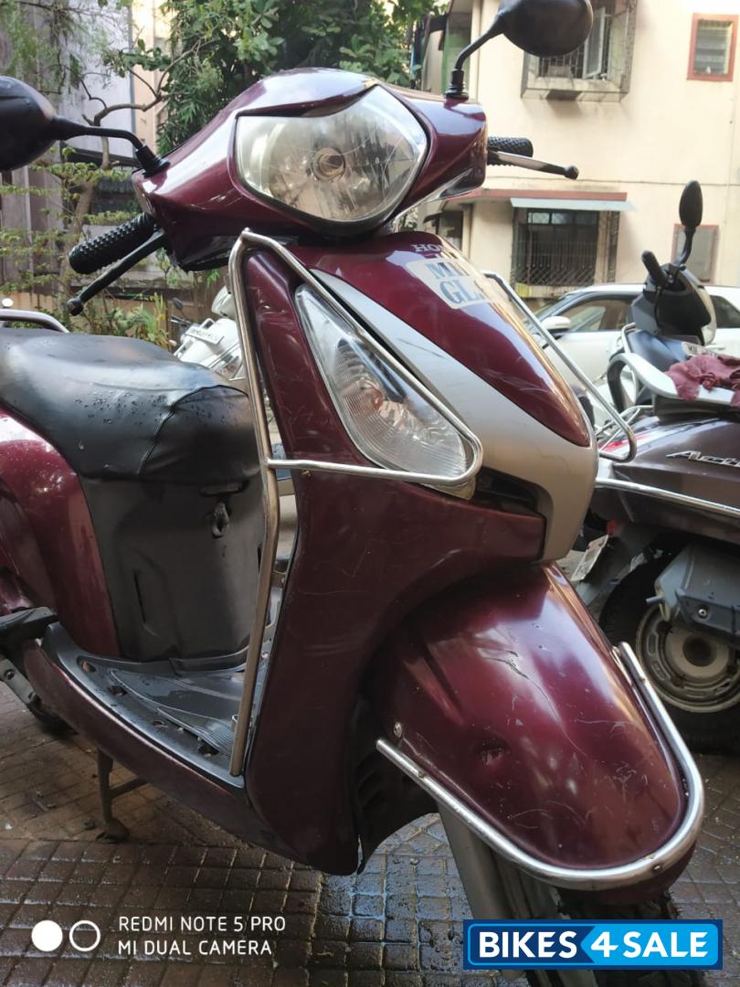Maroon Honda Aviator