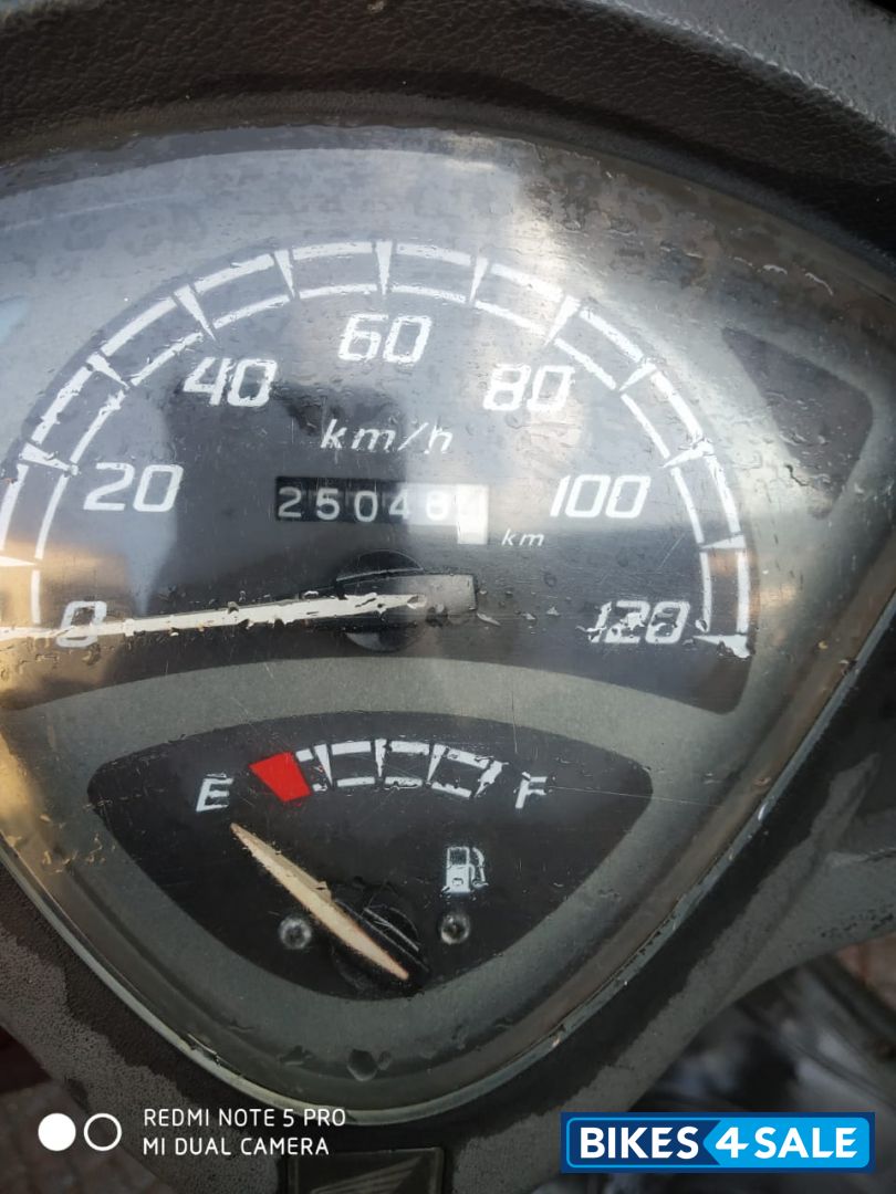 Maroon Honda Aviator