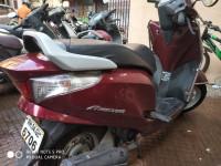 Maroon Honda Aviator