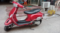 Matte Red Vespa SXL 125