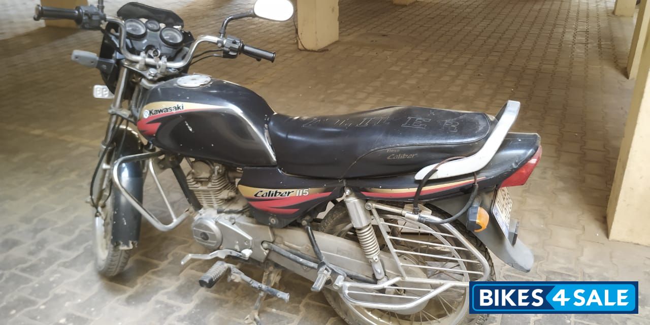 Black And Red Bajaj Caliber 115