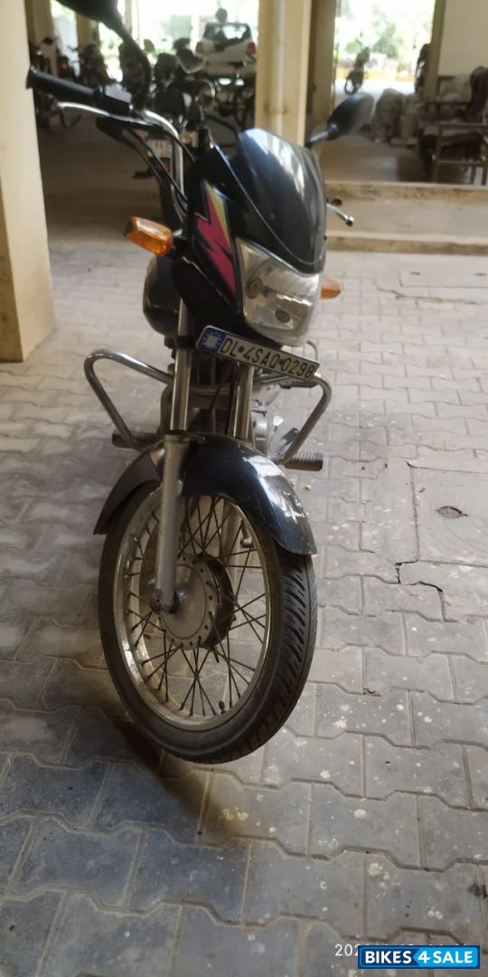 Black And Red Bajaj Caliber 115