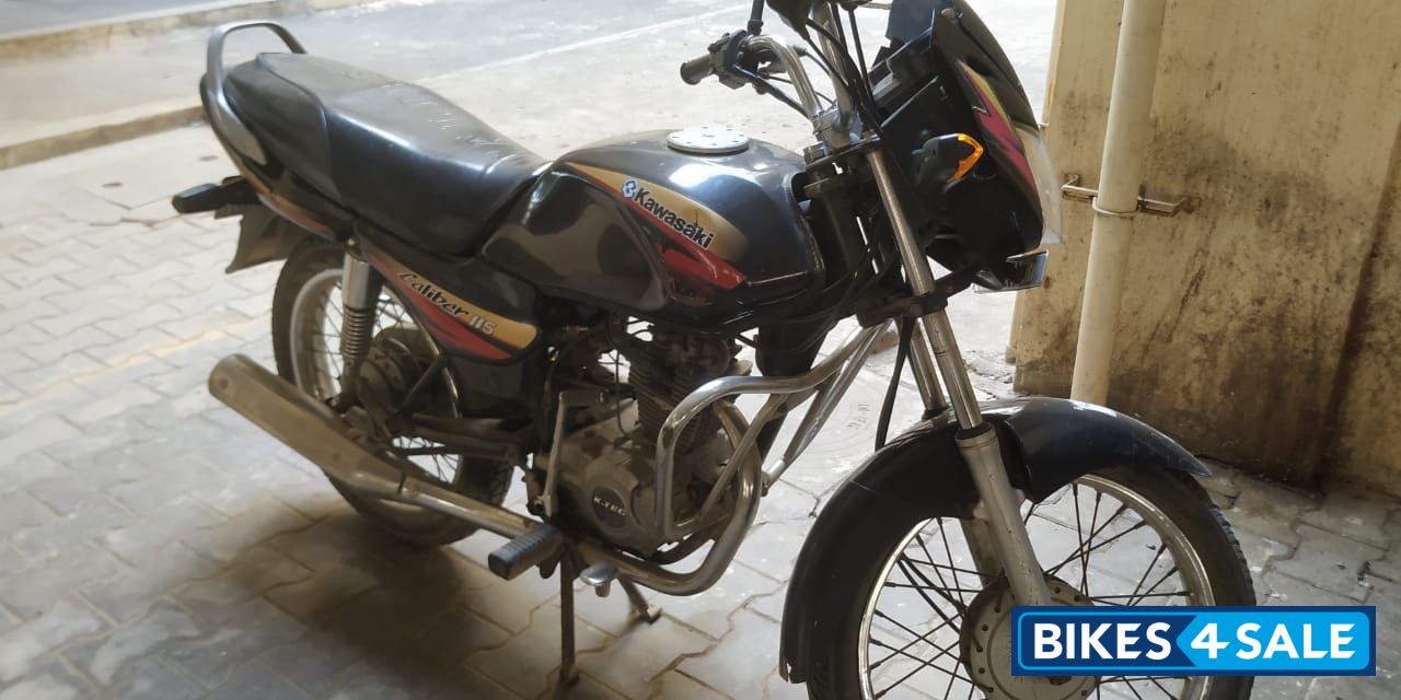 Black And Red Bajaj Caliber 115