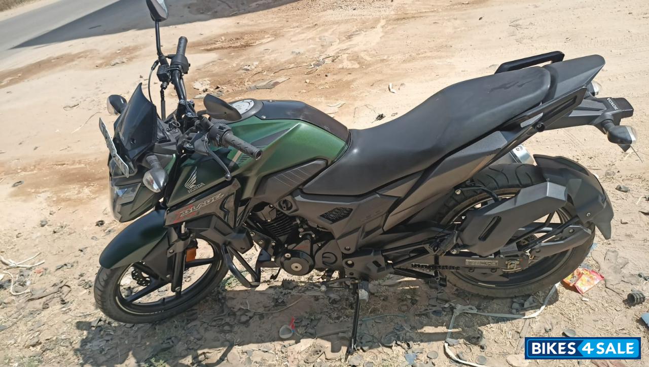 Green And Black Honda XBlade