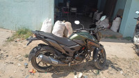 Green And Black Honda XBlade