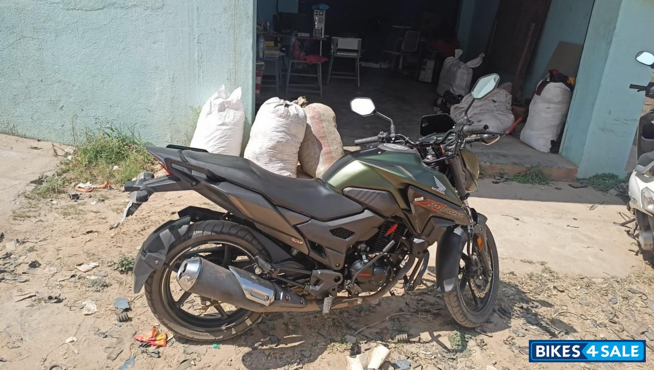 Green And Black Honda XBlade