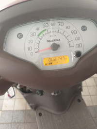 Maroon Suzuki Access 125 Special Edition