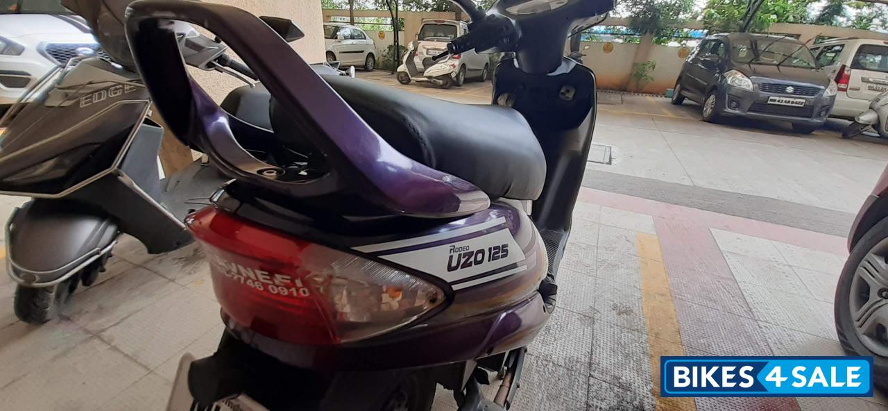 Purple Mahindra Rodeo UZO 125