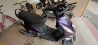 Purple Mahindra Rodeo UZO 125