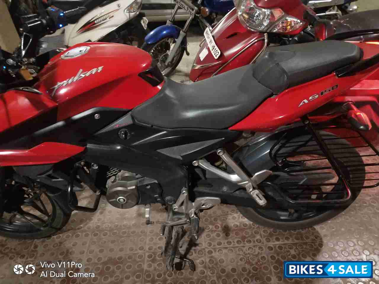 Red Bajaj Pulsar AS 150