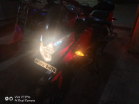 Red Bajaj Pulsar AS 150