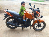 Yellowish Orange Suzuki SlingShot Plus