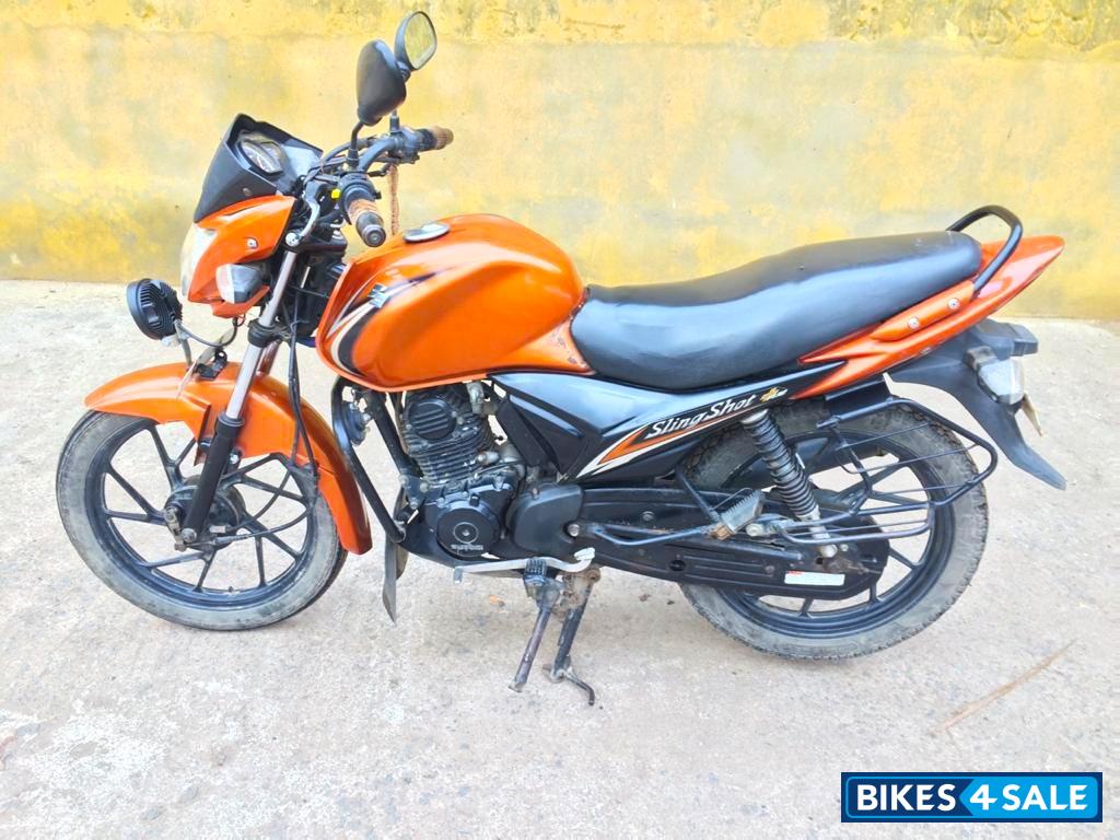 Yellowish Orange Suzuki SlingShot Plus