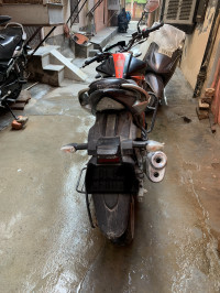 Black And Orange Suzuki Gixxer SP