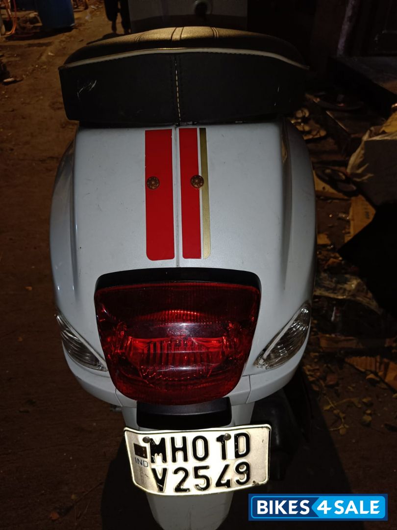 White Vespa Racing Sixties 125