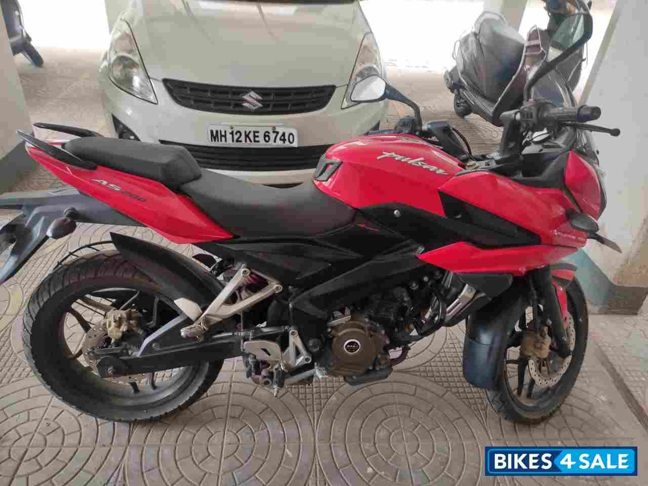 Red Bajaj Pulsar AS 200