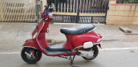 Red Vespa SXL 150