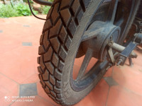 Black & Red Bajaj Discover 125