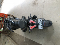 Black And Grey Bajaj Pulsar RS 200