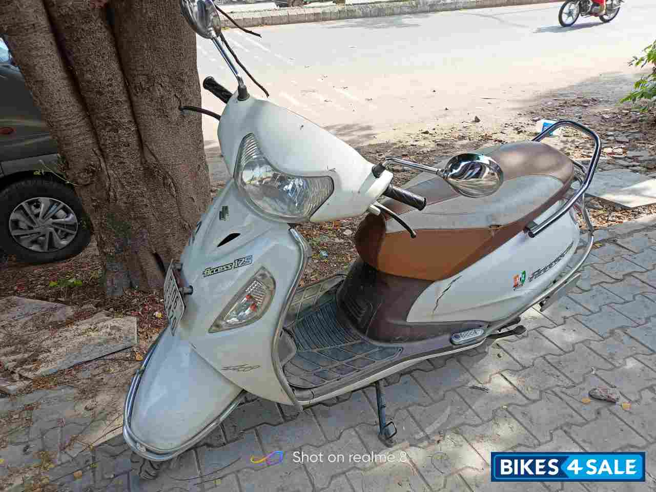 White Suzuki Access 125