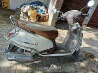 White Suzuki Access 125