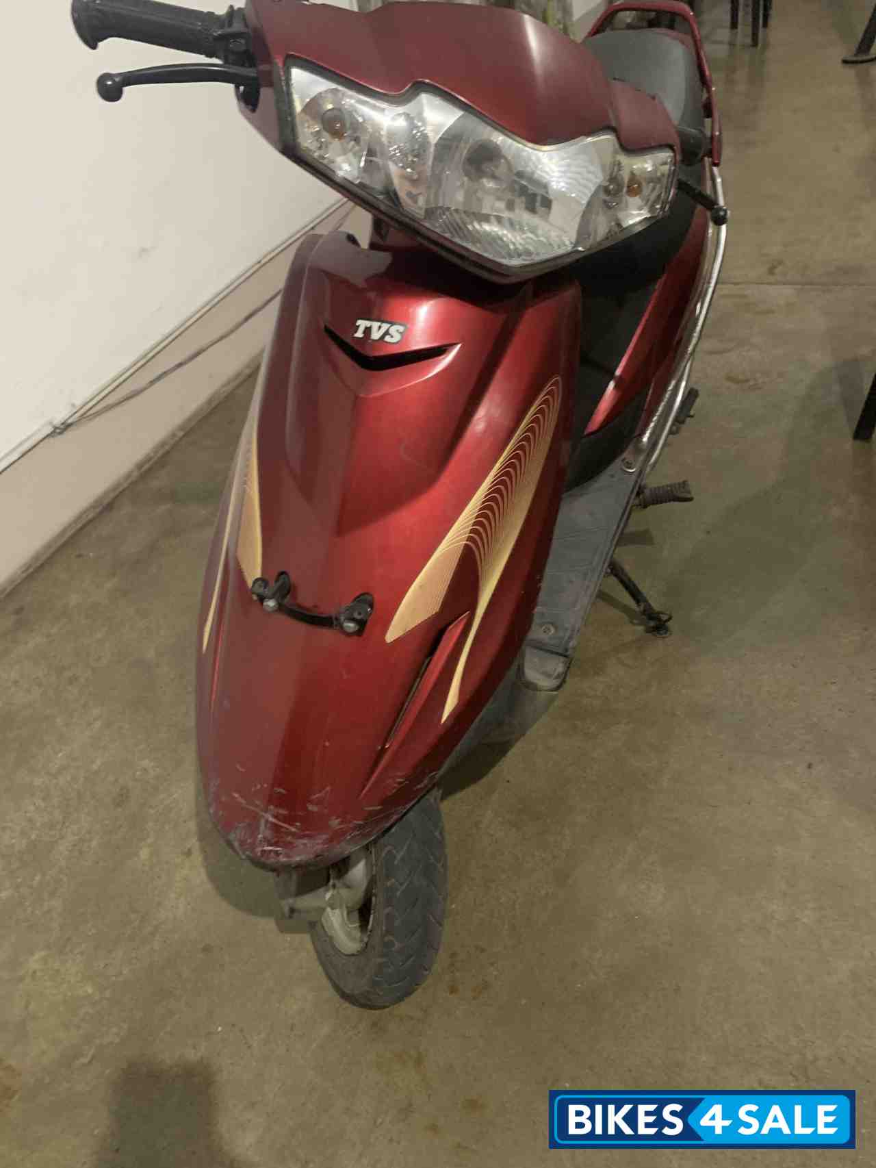 F. Red TVS Scooty Teenz