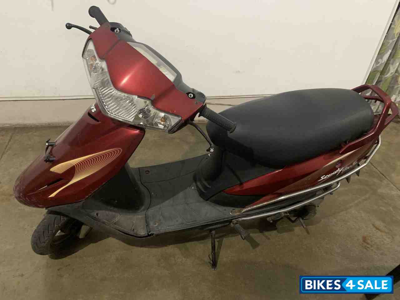 F. Red TVS Scooty Teenz