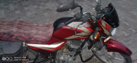 Red Black Bajaj CT 100 ES