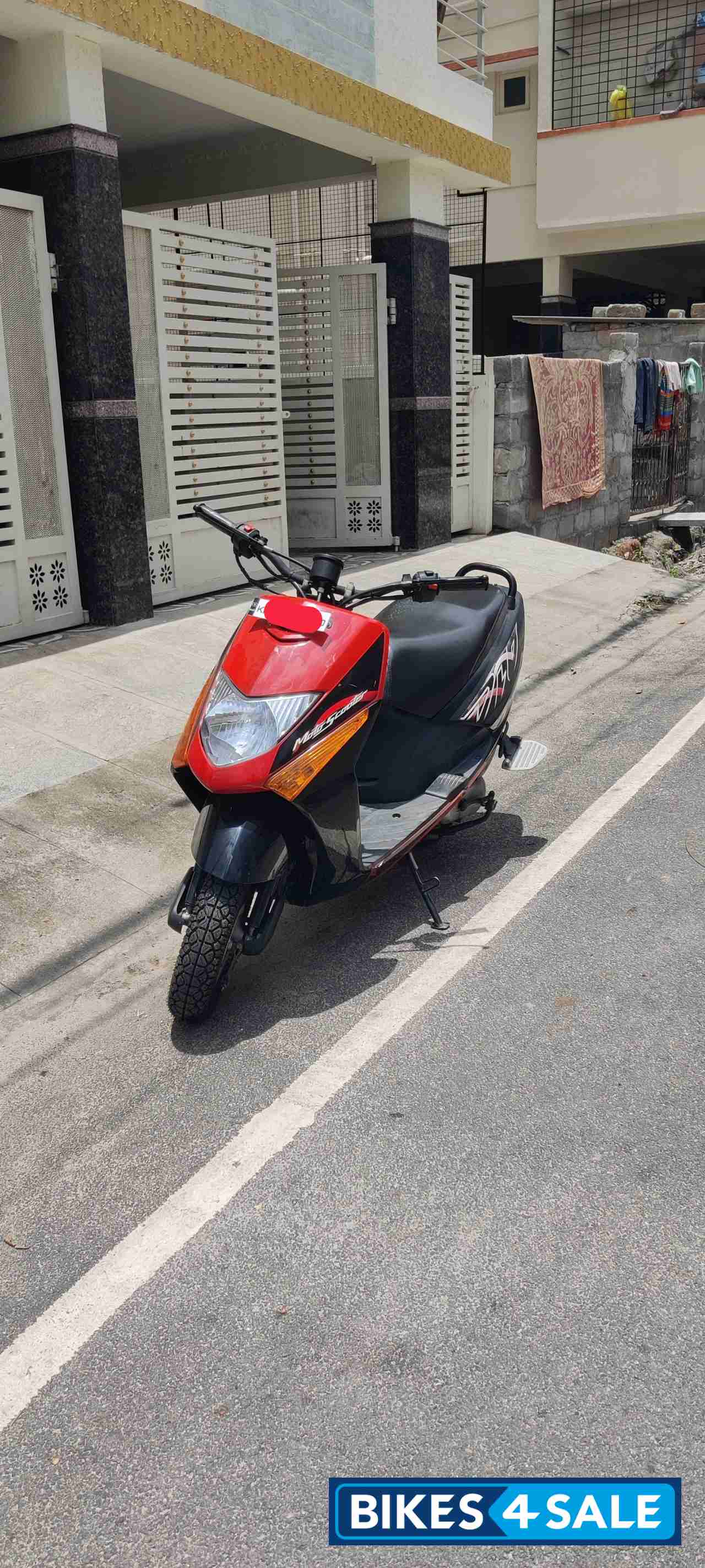 Red And Black Honda Dio
