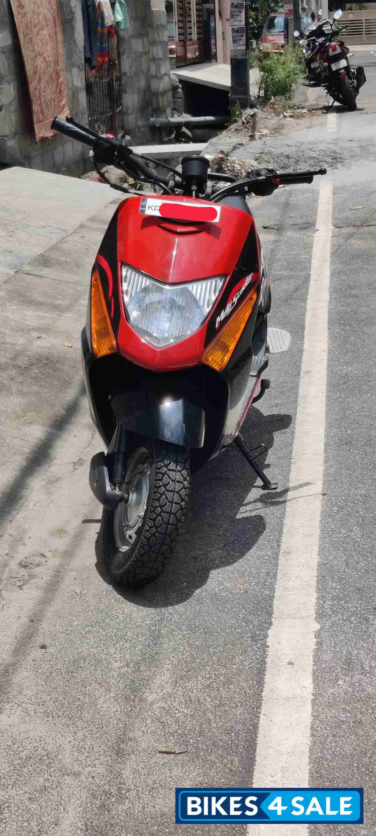 Red And Black Honda Dio