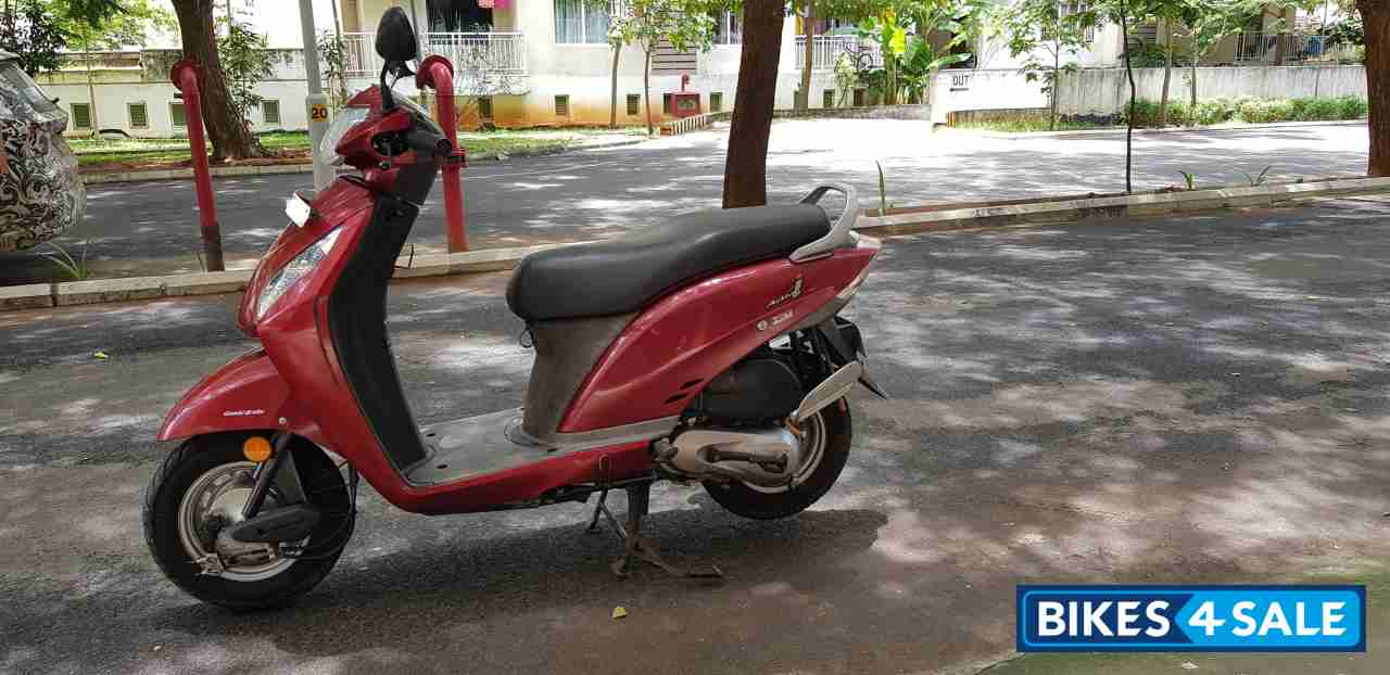 Cherry Red Honda Activa i