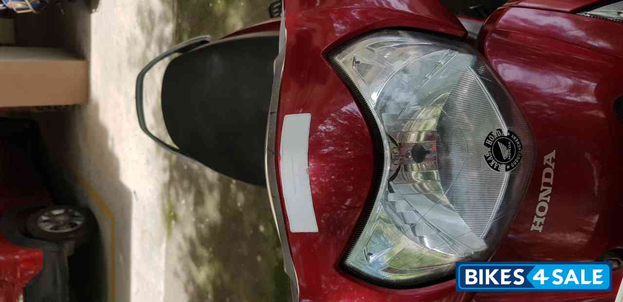 Cherry Red Honda Activa i