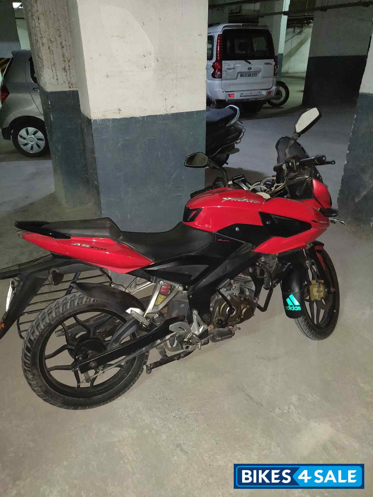Red Bajaj Pulsar AS 150