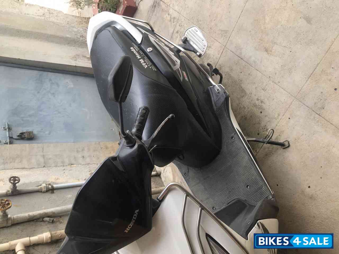 White And Black Honda Dio