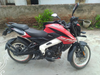 Red And White Bajaj Pulsar 200 NS ABS