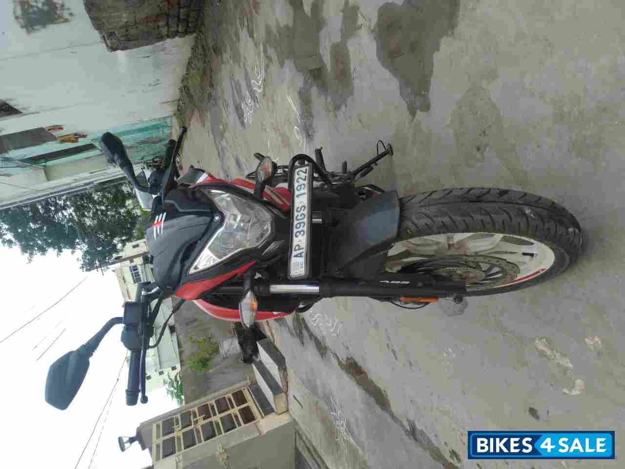 Red And White Bajaj Pulsar 200 NS ABS