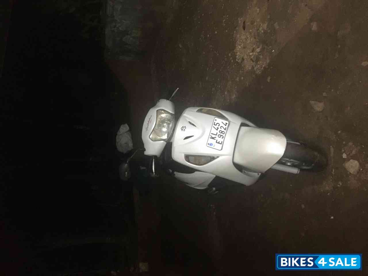 White Suzuki Access 125