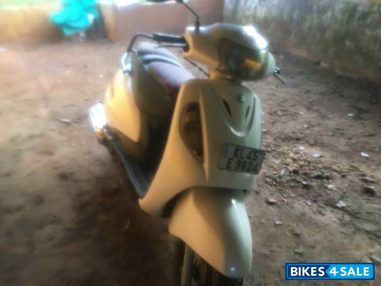 White Suzuki Access 125