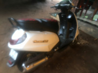 White Suzuki Access 125